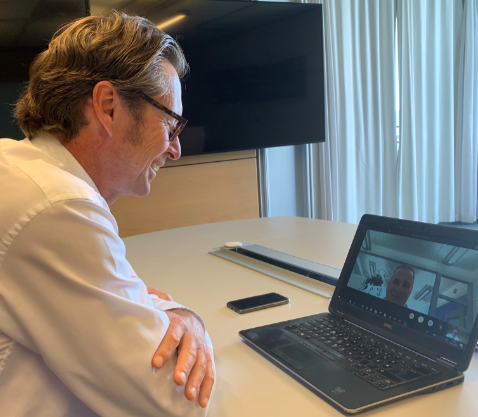 DNV GL - Maritime CEO Knut Ørbeck-Nilssen (left), speaks with Juha Koskela, Managing Director, ABB Marine & Ports, via laptop at the signing.